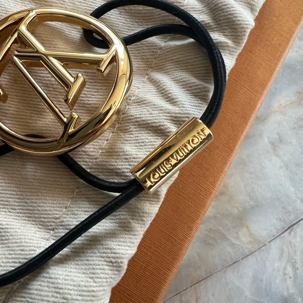 Authentic Louis Vuitton Gold Circle Elastic Hair Tie - Picture 3 of 3